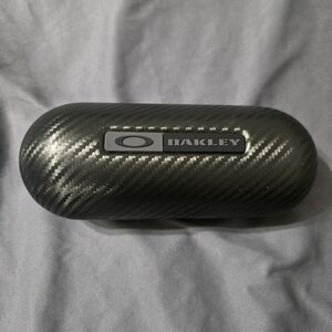 OAKLEY CARBON FIBER HARD CASE, LARGE VAULT, TORPEDO STYLE GRAY / BLACK COLOR